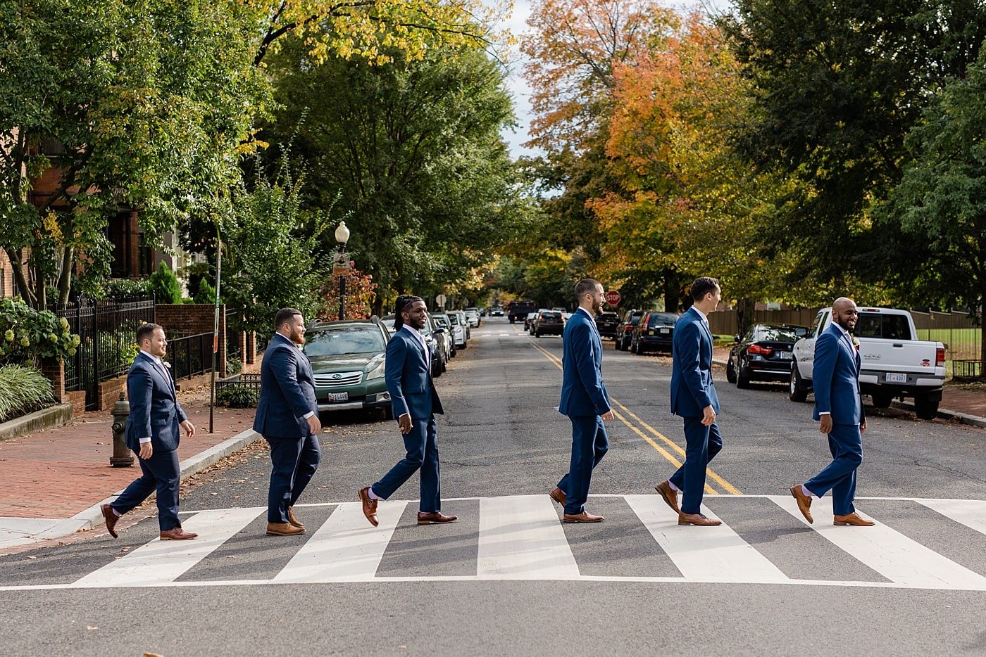Groomsmen crossing the street on Washington DC wedding day