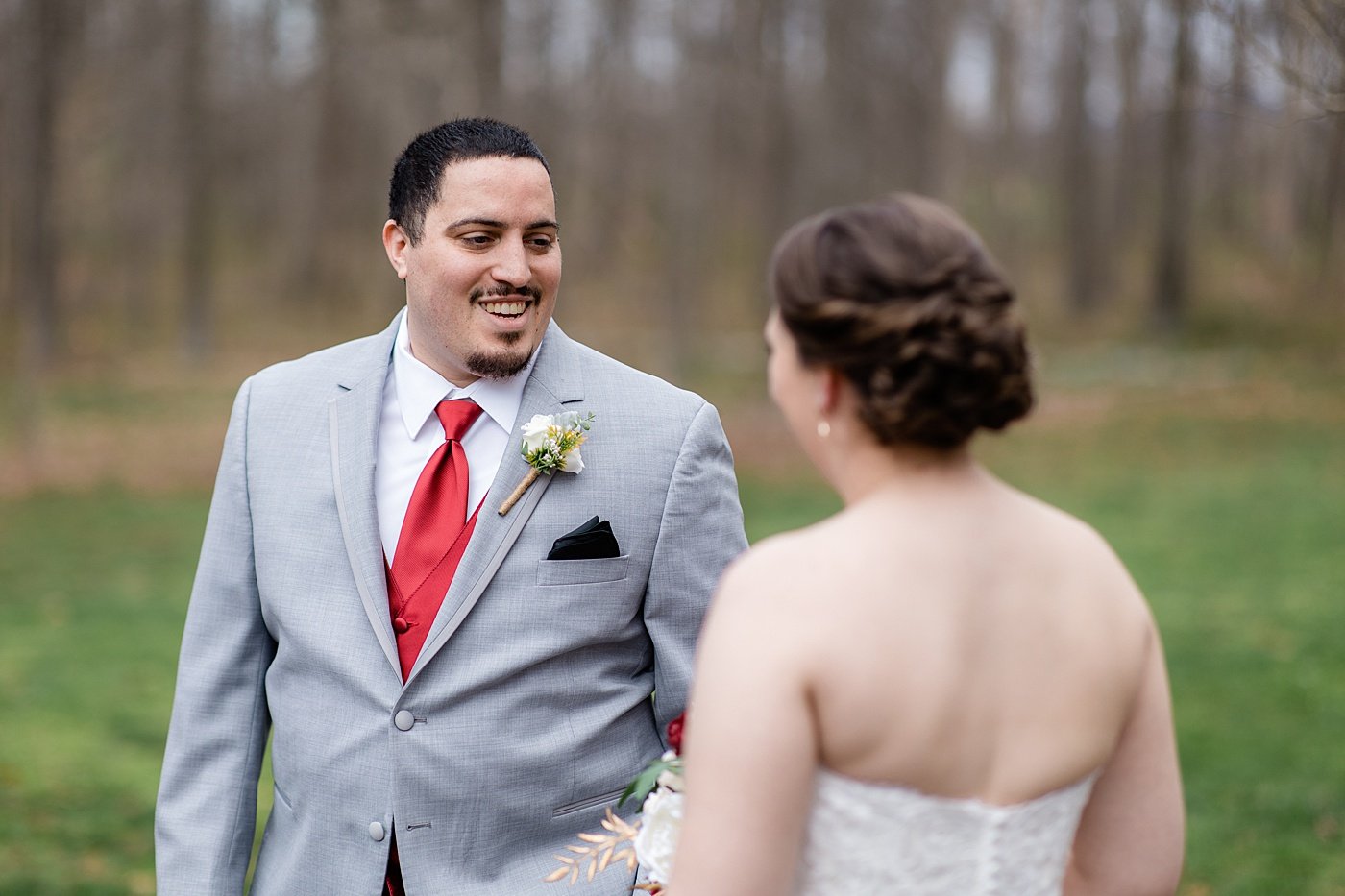 Bride and groom first look at winery wedding