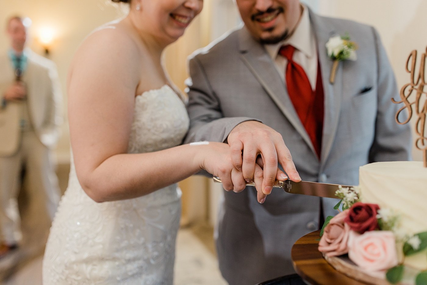 Virginia winery wedding reception cutting the cake